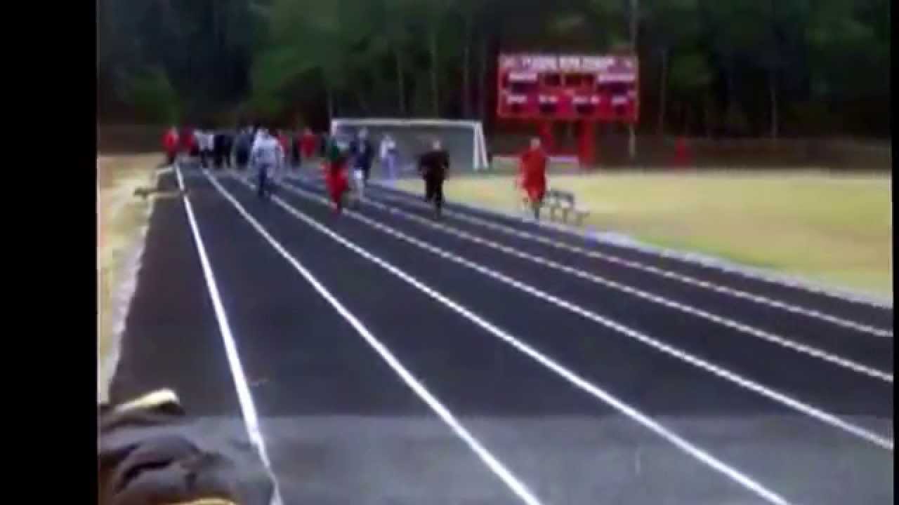 Max Moore sprinting the 100 meter dash.