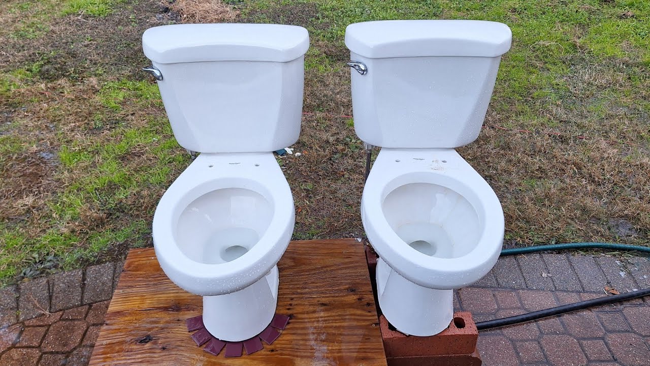 Two 2005 American Standard Compact Toilets