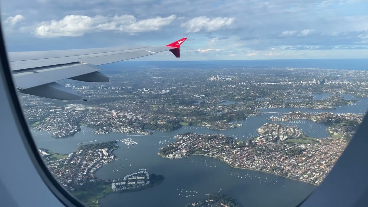 Qantas A380  premium economy,slow climb take off from Sydney Airport,Great views of Sydney harbour 