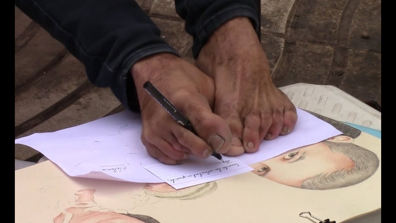 Disabled man writes draws and paints with his feet AMAZING talent