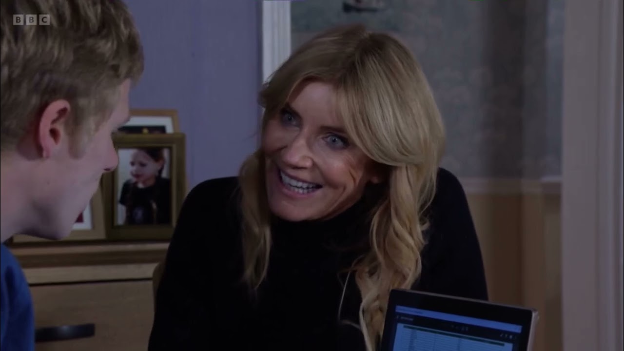 Eastenders Cindy gives Bobby the bottle of champagne to not make Bobby suspicious scene
