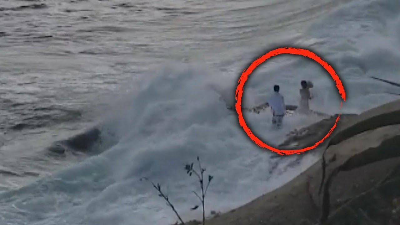 Newlyweds Rescued After Being Swept Into Ocean While Taking Photos