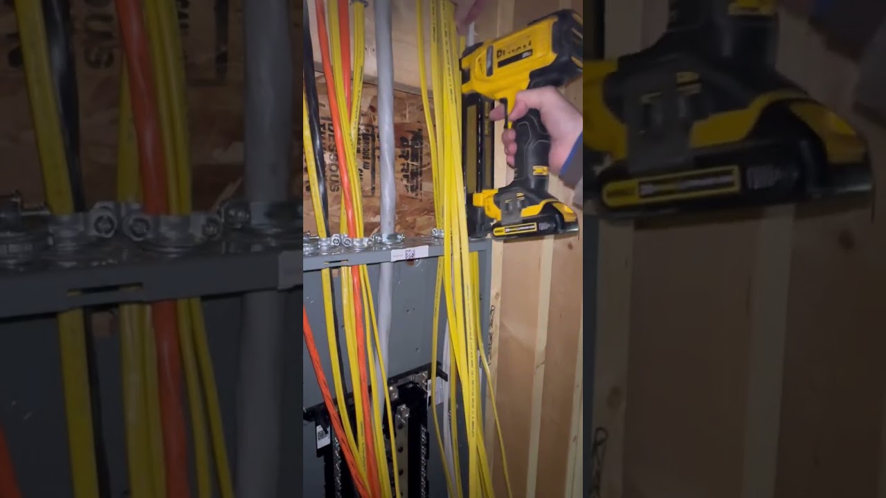 Installing wires in electrical panel. #electrician #construction #trades