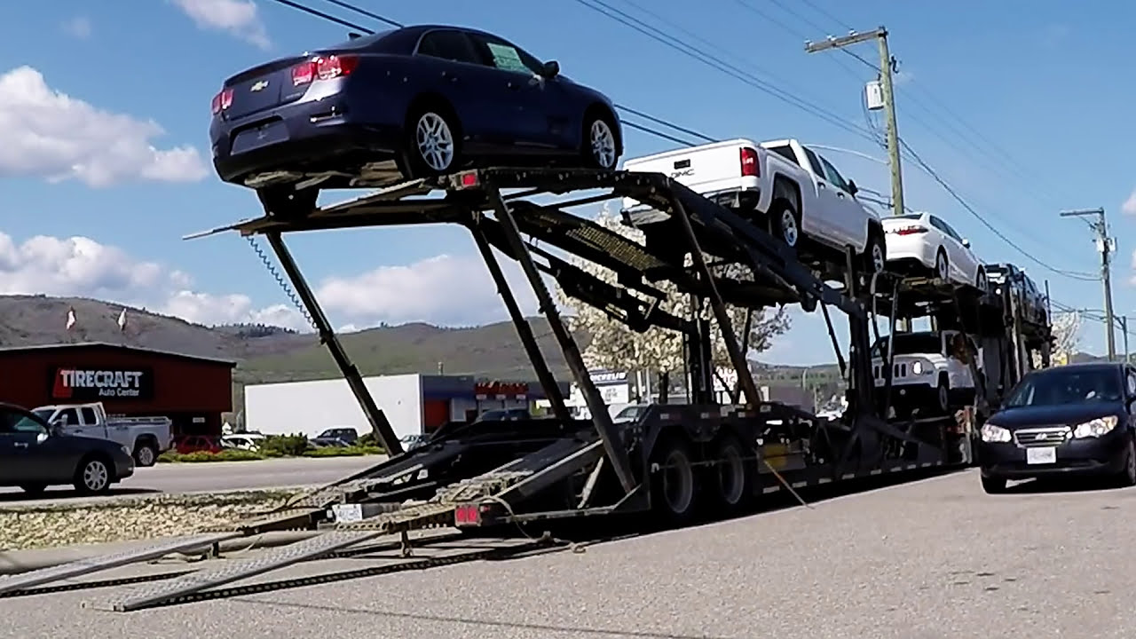 AUTO TRANSPORT CARRIER:  Sped-up Unload. [Unload Takes 6 Min.] -- Jeep, GM, Toyota (Car Hauler)