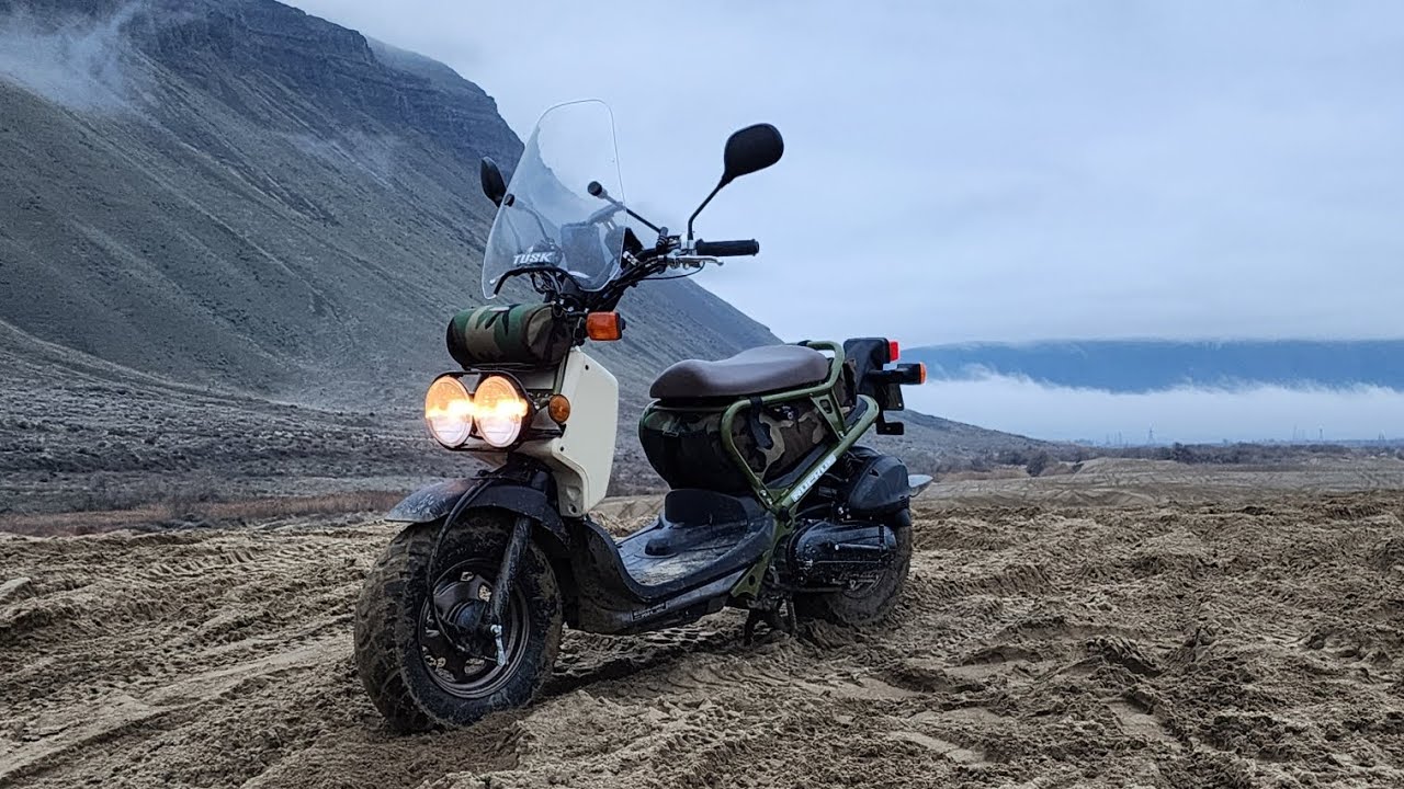 Honda Ruckus riding at an offroad park. Desert Scooter Adventure