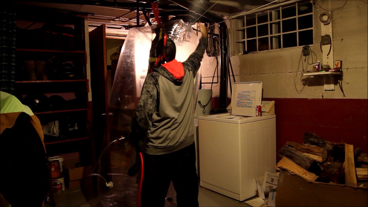 Defying Gravity In Inflatable Vinyl Bondage Sack