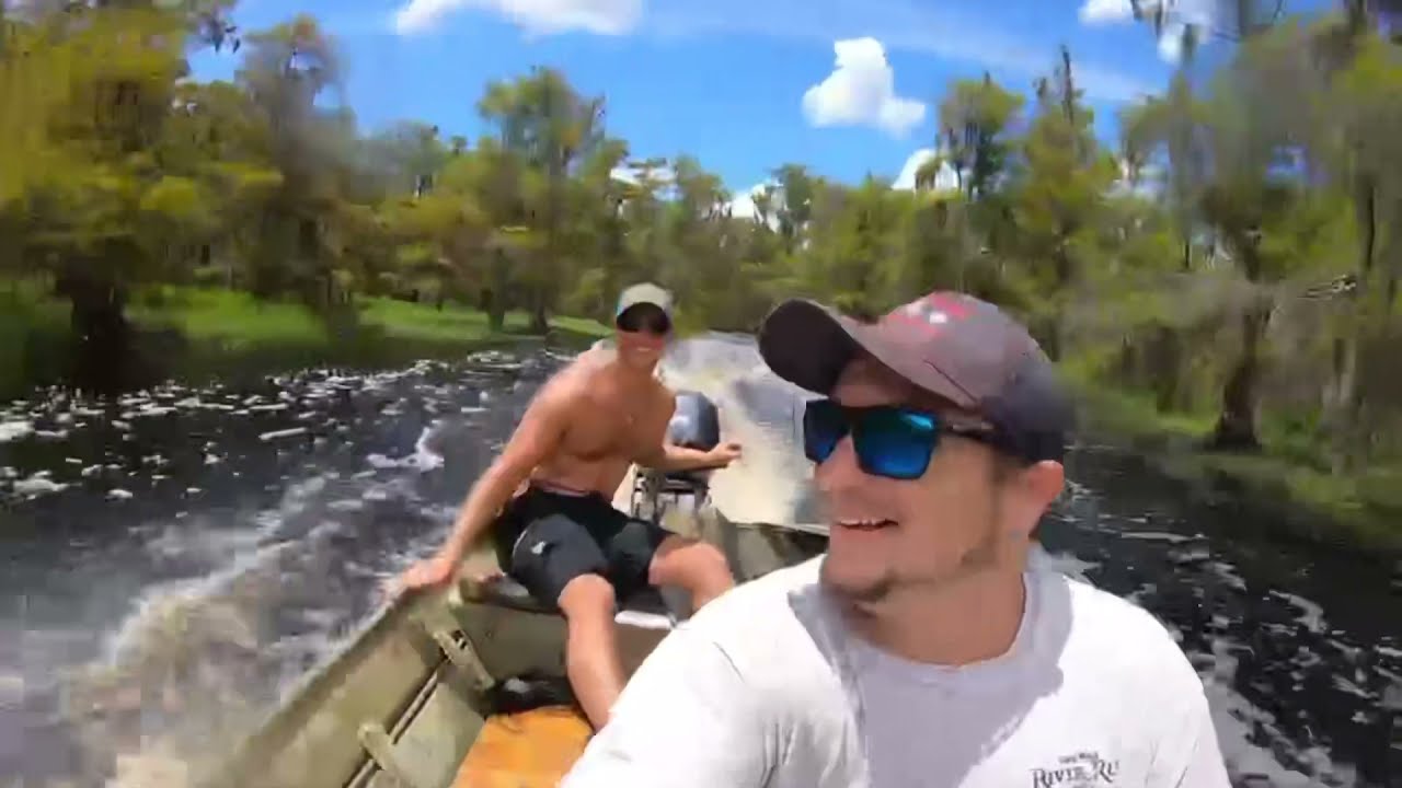 Even when we're not in the race boats, we are racing boats (ripping jon boats through tight trails)