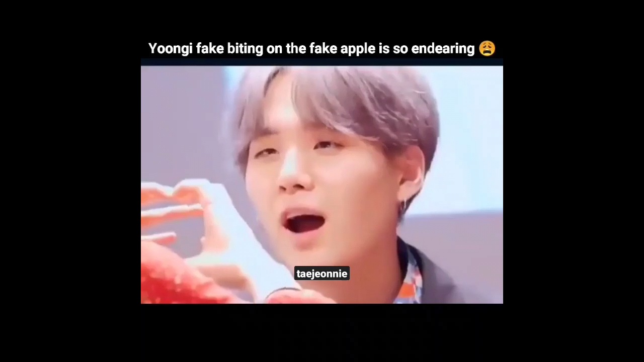 Yoongi fake biting an apple.. I can't unsee this 😭