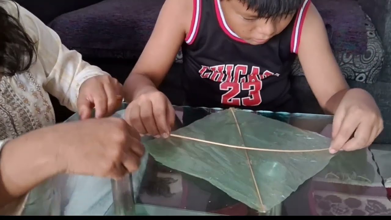 me and my mom making kite for dasai