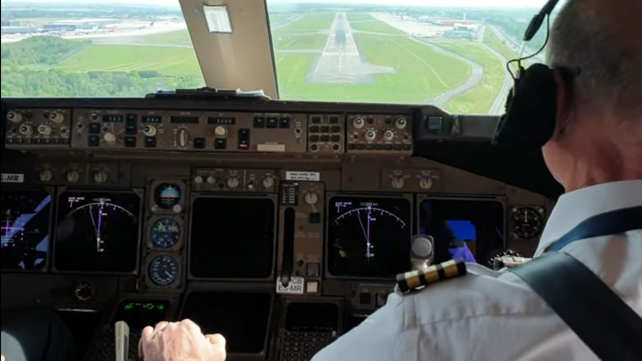 (Cockpit view).  747 land at liege airport BELGIUM . Full approach