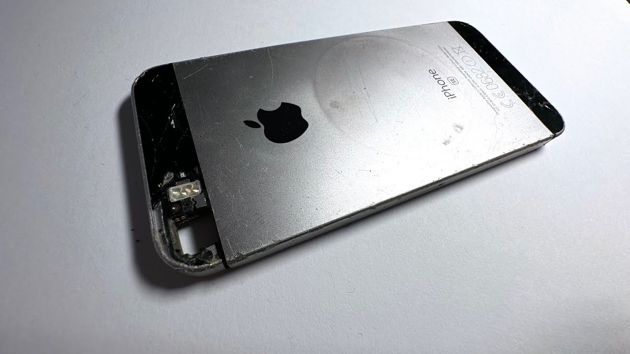 Damaged iPhone SE disassembly of functional parts