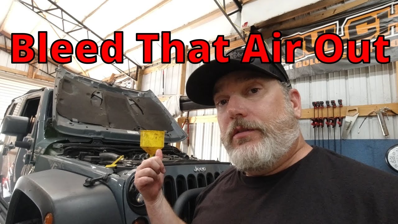 Удалить воздух из системы охлаждения на Jeep Wrangler
