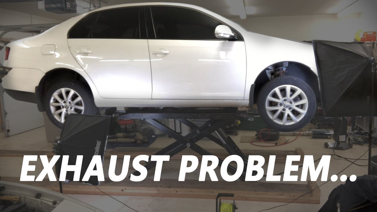 Fixing the Exhaust on the MK5 Volkswagen Jetta!  - DIY Repair!