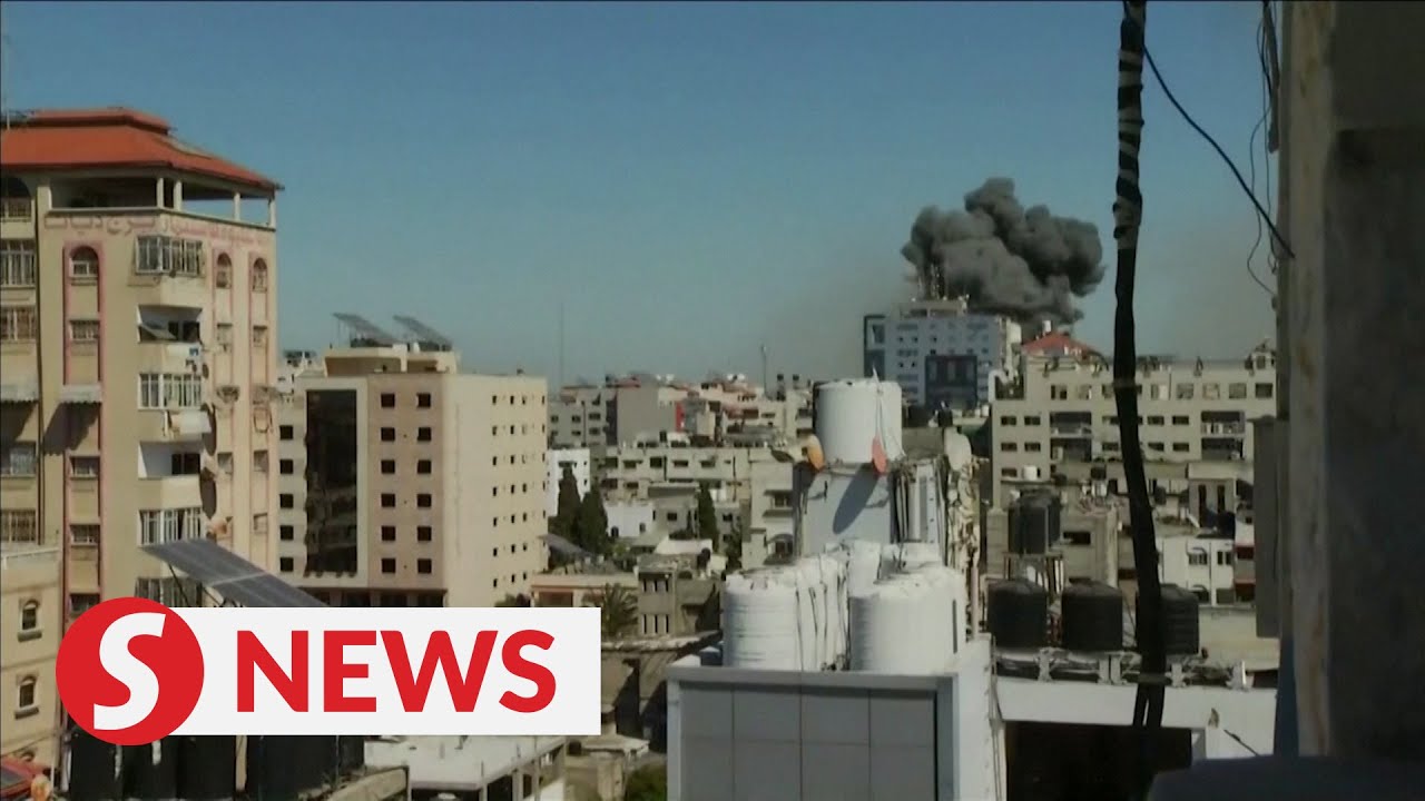 The moment office tower in Gaza hit by Israeli missile strike