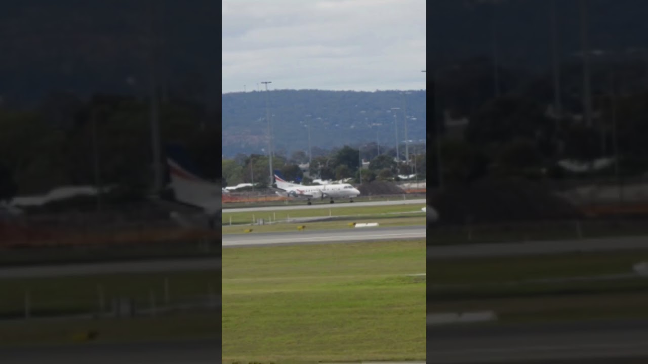Rex Saab 340B on taxi way Charlie