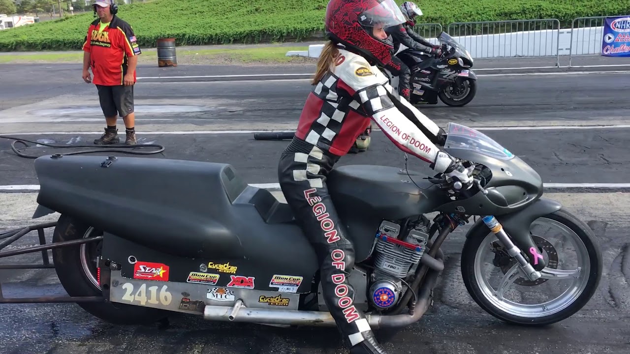 Talented Female Dragbike Racer Robin Procopio battles a Hayabusa in the Pro ET Final