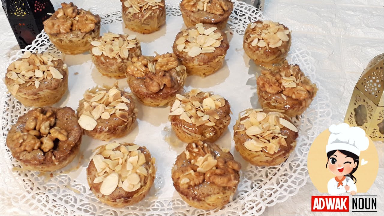 عشيشات على شكل طارط بكريمة اللوز بالقرمشة و التعليكة ديال الكونافة 😋 أكيدة غادي تنال اعجابكم 👌