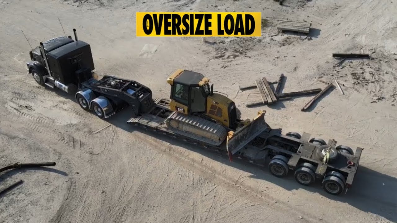 POV / Kenworth hauling CAT D5 dozer (OVERSIZE LOAD)