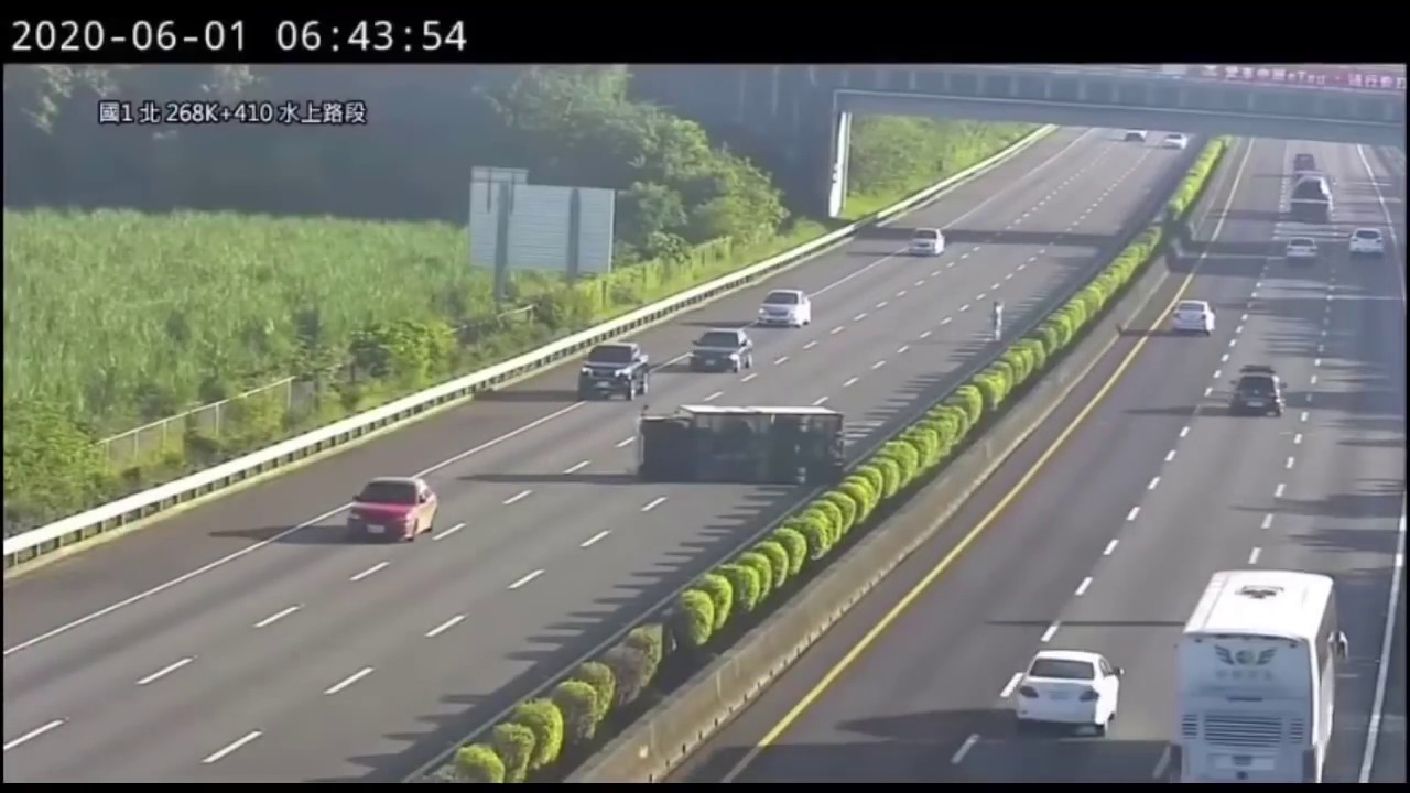 Tesla Model 3 crashes into overturned truck on highway