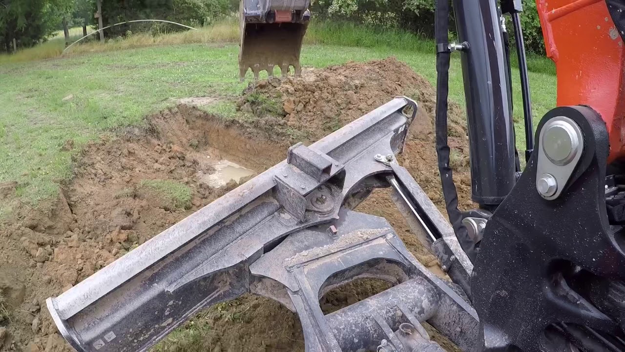 Kubota KX057, yeah I busted it