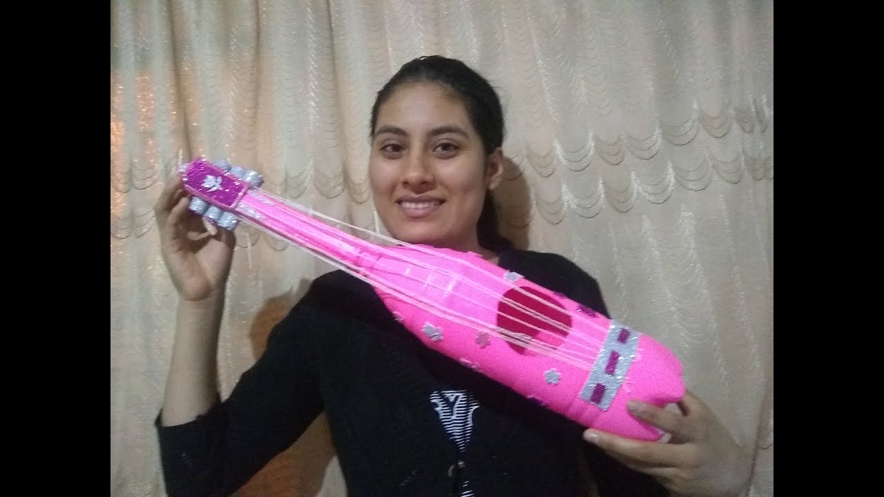 Proyecto de reciclaje-Elaboración de una guitarra con material reciclable