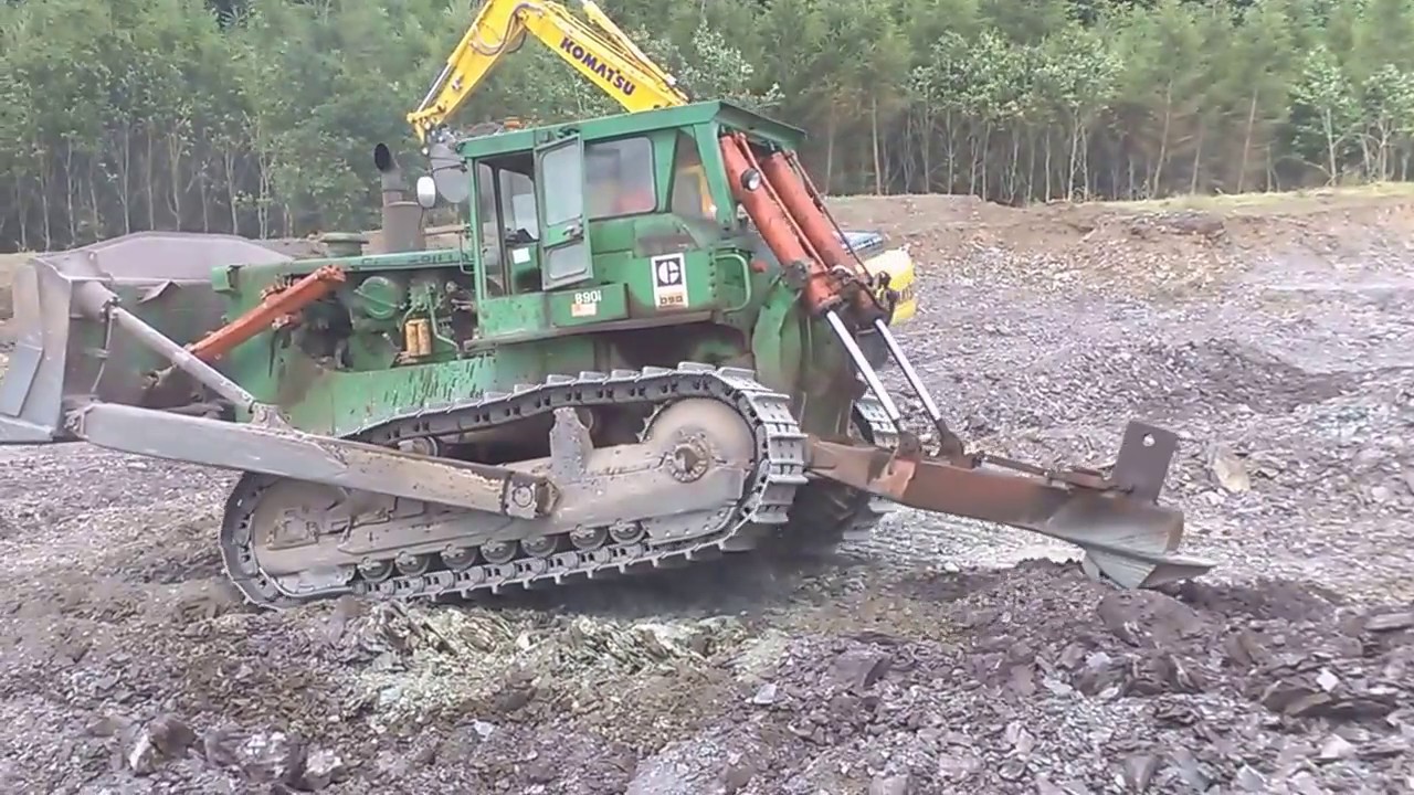 CAT D9 dozer working on a road construction site