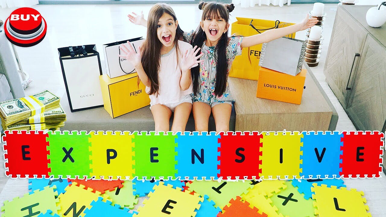 I'LL BUY Whatever You Can SPELL Challenge! Giant Spelling Game! | Emily and Evelyn