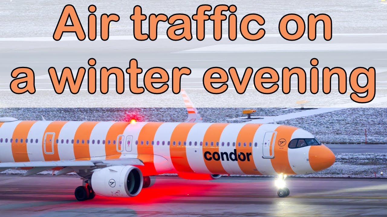 Zurich Airport air traffic on a winter evening with landings on runway 14.