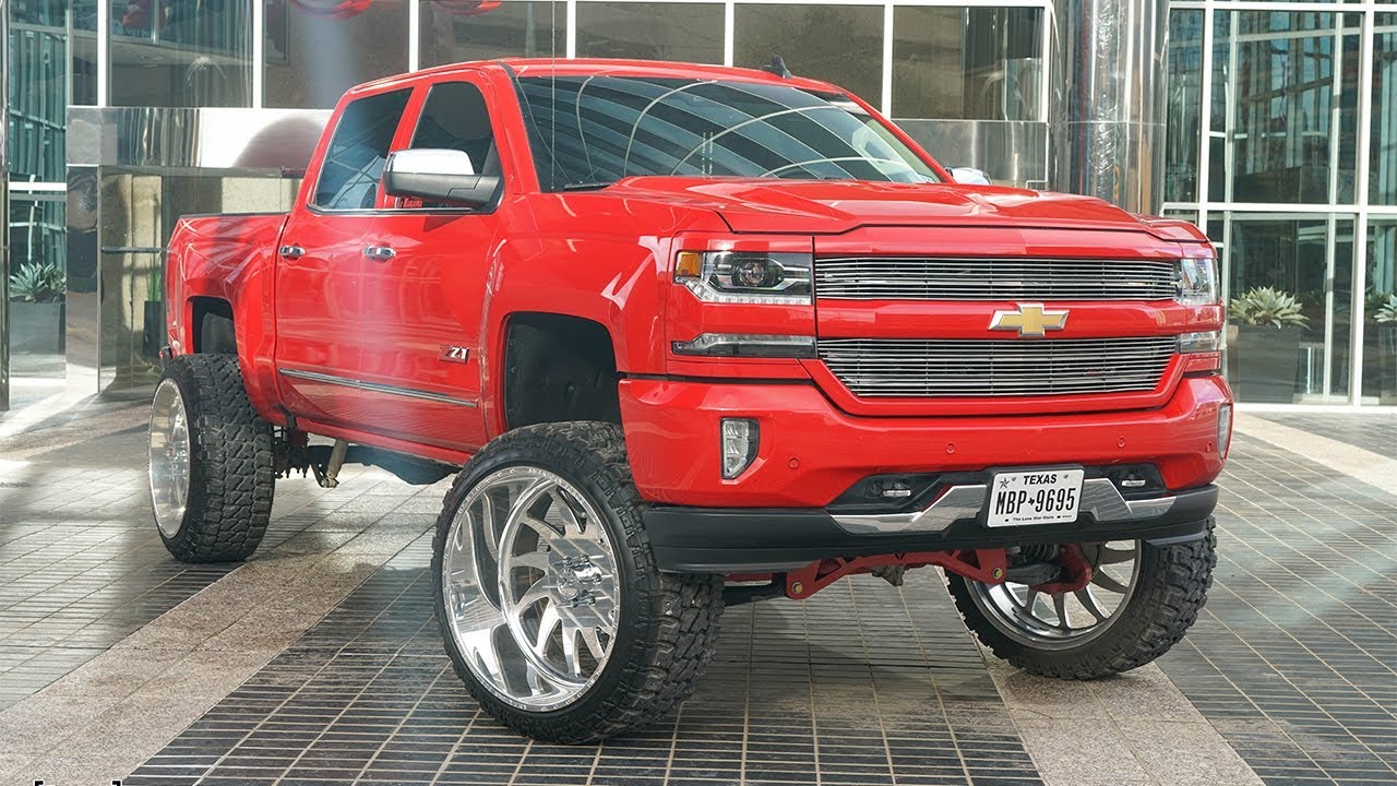 2017 Chevy Z71 on a 9 inch lift with 26x14s cruises in Midland Texas!