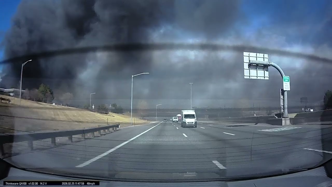 fire on 84th and i 25. Going through smoke rear view 