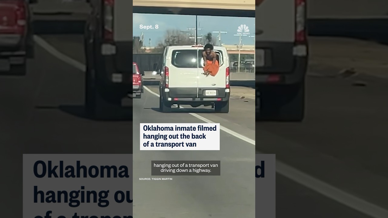 Oklahoma inmate filmed hanging out the back of a transport van