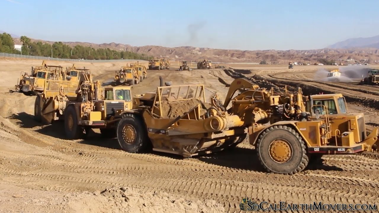 CAT 657 scrapers grading for large new commercial pad