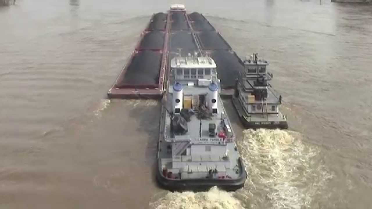 Coal barge upstream in flood at Cincinnati