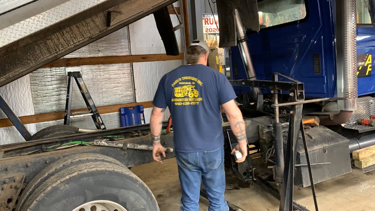 Dump Truck steerable Lift Axel Remove old and Install new.