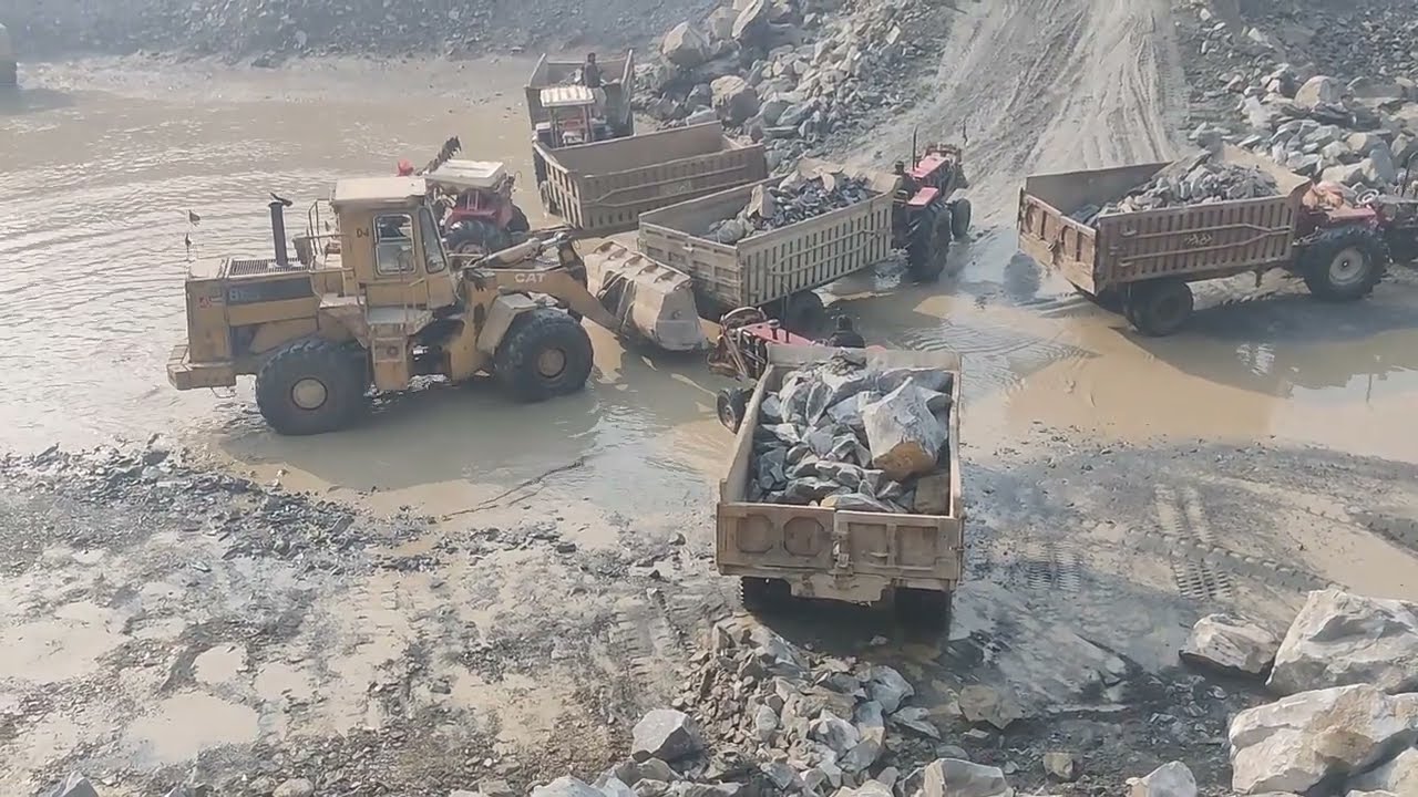 Fabulous Stone view in Mountain: Bigger Caterpillar Laoder & Bigger Dumper & Trolley Loading Stone 