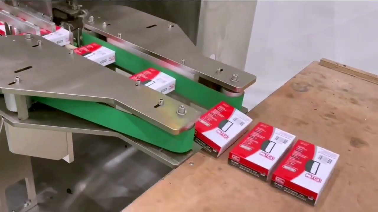 Plastic parts flow wrap packing +visual robot spider pickup +cartoning line