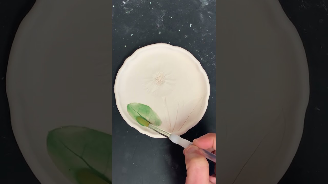 How I create a ceramic jewelry dish with a calendula flower pressed in clay #pottery #flower #art