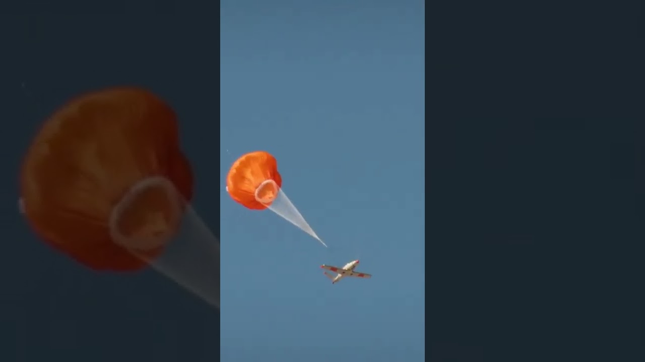 Airplane Landing With Parachute