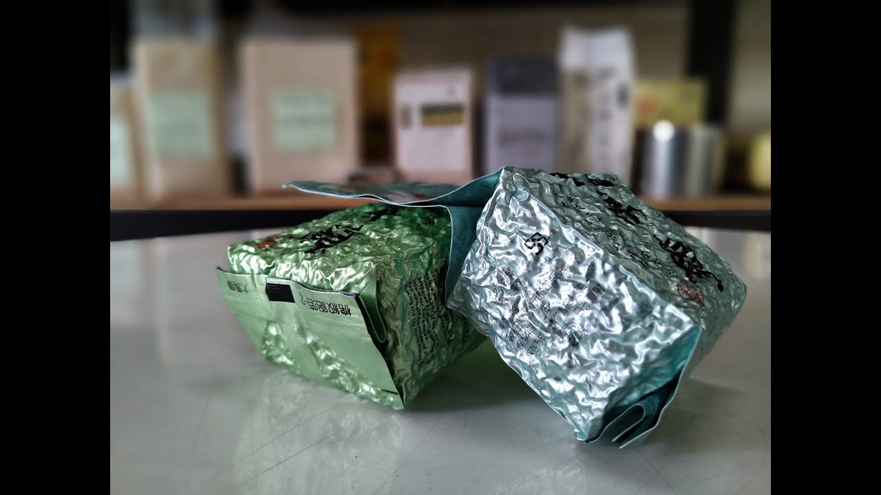 Pre made pouch auto filling and sealing vacuum packing machine for tea leaf/tea leaf vacuum
