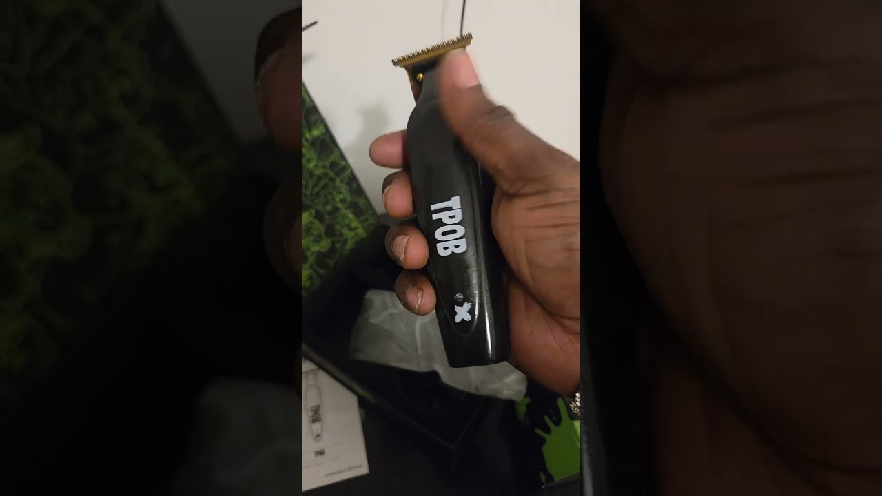 Tpob black x trimmer with gold psycho blade 