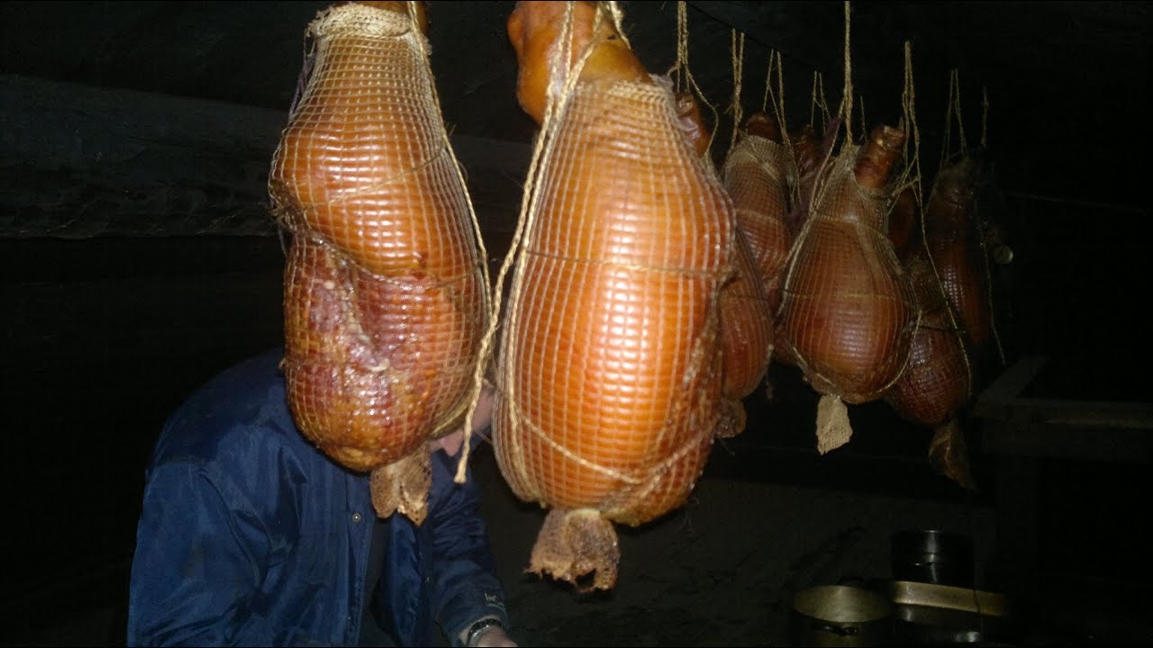 Smoking hams in a Finnish smoke sauna