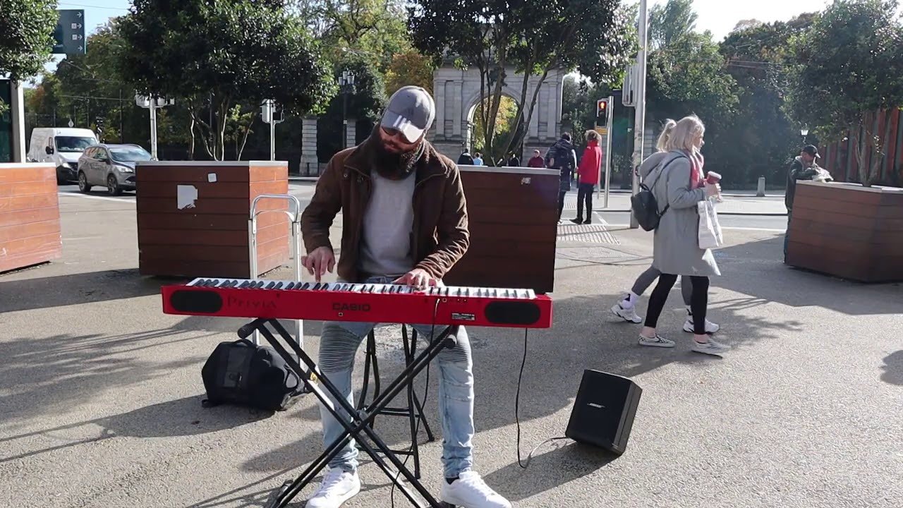Busker Javier Alcaraz demonstrating his piano skills on Grafton St w/Autumn Leaves (Filmed Oct '20)