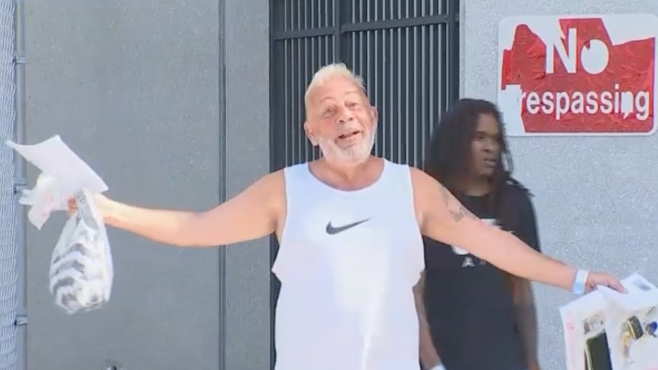 Prison-costumed protester speaks after arrest at Trump's indictment hearing near Miami courthouse
