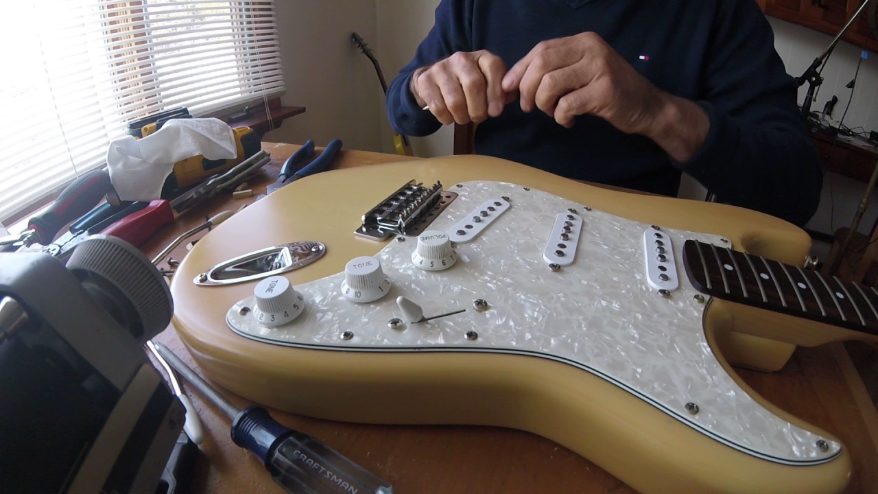 How to change a Stratocaster Guitar Bridge.