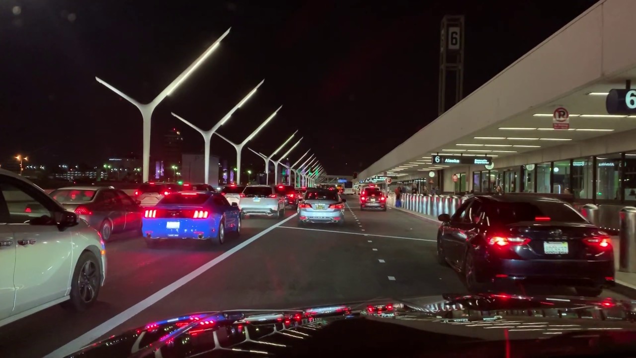 LAX Los Angeles pickup and drop off for Uber and Lyft on upper Departures level on a busy day
