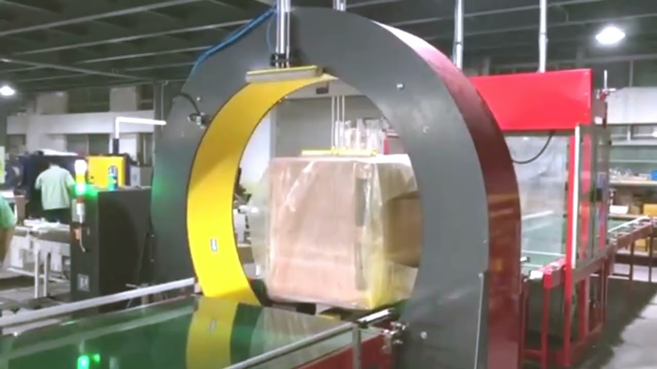 Film sleeve wrapping machine for big crate cartons etc