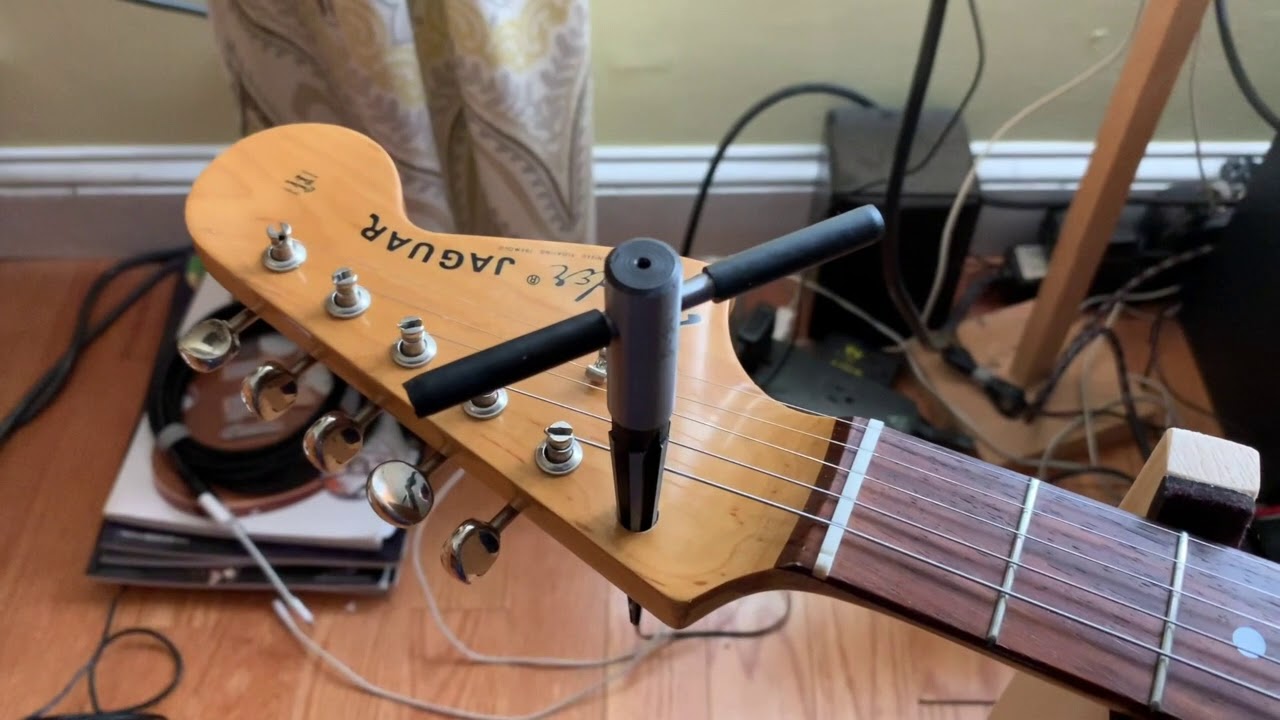 Enlarging tuner holes on Fender Jaguar