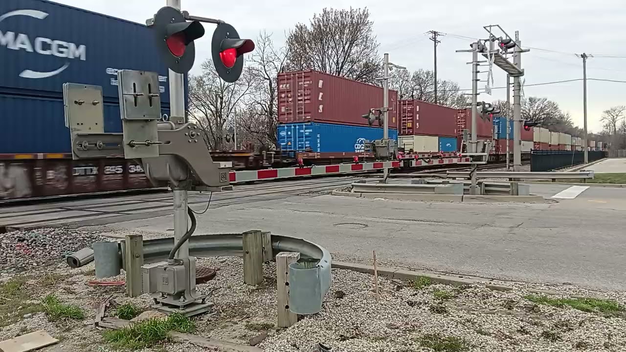  BNSF 6560 gevo leading double Stack train through Olathe Kansas on Tuesday march 17th at 5:56pm