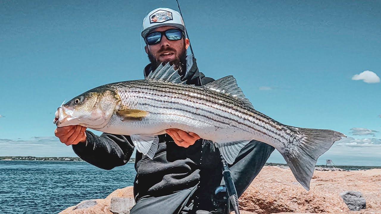 Striped Bass on Bucktails in CRYSTAL CLEAR Intlet Currents - Surf Fishing on Long Island , New York