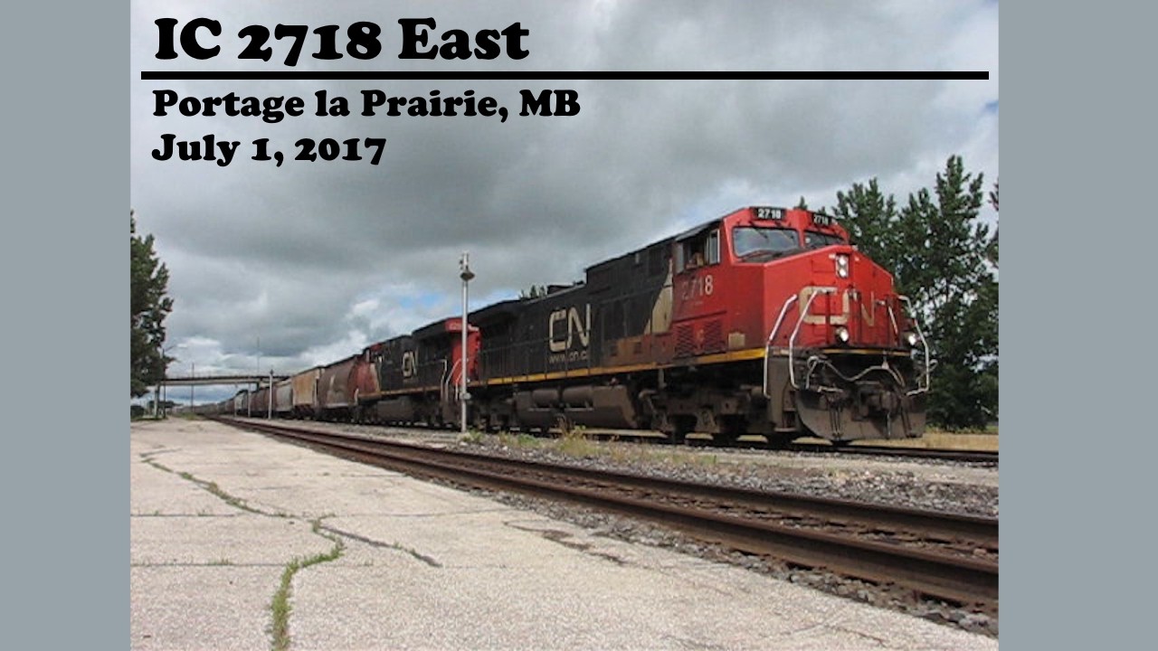 IC 2718 and a Grain Train Through Portage la Prairie, July 1, 2017